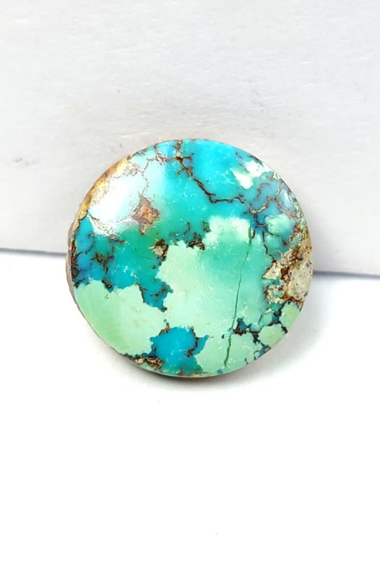 Circular turquoise stone